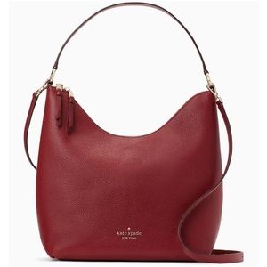 Classic Kate spade in perfect condition.pebble red leather. Zippy